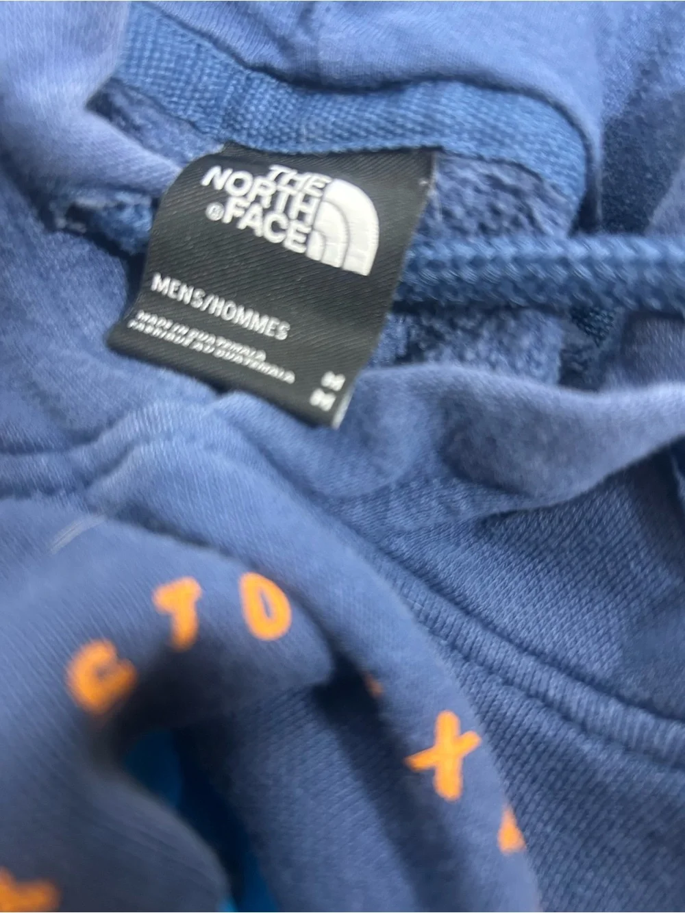 The North Face Men's Navy Pullover Hoodie with Blue Logo and Orange Accent